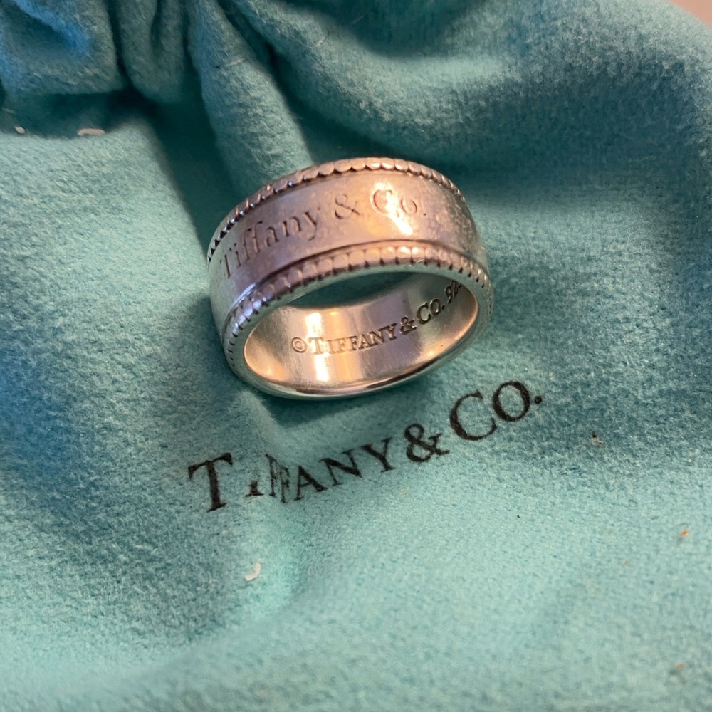 Authentic Tiffany & co. Silver ring Size 5.